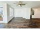 Living room featuring hardwood floors, white walls, recessed lights, ceiling fan and natural light at 3187 Moor View Rd # 37, Duluth, GA 30096