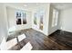 Bright sunroom featuring hardwood floors, white walls, recessed lights and an abundance of natural light at 3187 Moor View Rd # 37, Duluth, GA 30096