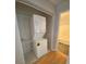 Laundry closet features a stackable washer and dryer unit at 3980 Bayside Cir, Atlanta, GA 30340