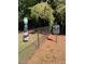 Well-maintained community pet area with waste station and pet exercise sign at 3980 Bayside Cir, Atlanta, GA 30340