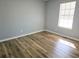 Bedroom with modern floors and natural light at 434 Ridgetop Nw Dr, Acworth, GA 30102