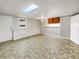 Spacious basement area with tiled floors, bright lighting, and ample storage at 1280 Pinyon Pl, Lawrenceville, GA 30043