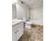Neutral bathroom featuring tile flooring, toilet, and shower-tub combination at 1280 Pinyon Pl, Lawrenceville, GA 30043