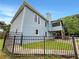 Two-story home featuring blue siding and a fenced yard at 1280 Pinyon Pl, Lawrenceville, GA 30043
