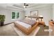 Stylish main bedroom with tray ceilings and neutral decor at 1280 Pinyon Pl, Lawrenceville, GA 30043