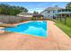 Inviting backyard pool with a slide and gazebo at 1280 Pinyon Pl, Lawrenceville, GA 30043