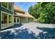 A wide backyard deck is adjacent to a home with beautiful windows and doors at 2938 Summitop Ne Rd, Marietta, GA 30066