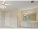 Bright bathroom featuring a white vanity and large framed mirror at 2938 Summitop Ne Rd, Marietta, GA 30066