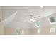 Well-lit bedroom with vaulted ceiling, ceiling fan, and skylights at 2938 Summitop Ne Rd, Marietta, GA 30066
