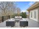 A backyard deck features two outdoor sofas and leafy outdoor rug at 2938 Summitop Ne Rd, Marietta, GA 30066