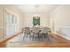 Bright dining room features stylish chandelier and plenty of natural light at 2938 Summitop Ne Rd, Marietta, GA 30066
