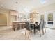 Bright kitchen featuring a center island with seating, skylights and stainless steel appliances at 2938 Summitop Ne Rd, Marietta, GA 30066