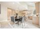 Bright eat-in kitchen with stainless appliances, center island and table with seating at 2938 Summitop Ne Rd, Marietta, GA 30066