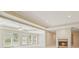 Cozy living area with a fireplace, large windows, and modern ceiling at 2938 Summitop Ne Rd, Marietta, GA 30066