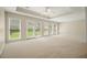 Bright living room boasts large windows, neutral walls, and stylish ceiling features at 2938 Summitop Ne Rd, Marietta, GA 30066