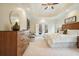 Serene main bedroom boasts a trey ceiling, balcony access, and tasteful furnishings for a relaxing retreat at 2938 Summitop Ne Rd, Marietta, GA 30066