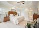 Spacious main bedroom suite with tray ceiling, sitting area, and neutral decor at 2938 Summitop Ne Rd, Marietta, GA 30066