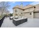 Back patio with ample outdoor seating and large windows on home at 2938 Summitop Ne Rd, Marietta, GA 30066