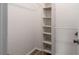 Walk-in closet with built-in shelving offering ample storage space at 707 Woodcliff Dr, Atlanta, GA 30350