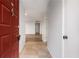 Inviting entryway with tiled flooring and wood flooring in the background leading into the home's interior at 707 Woodcliff Dr, Atlanta, GA 30350