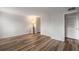 Living room featuring modern wood-look floors and neutral walls to complement any decor at 707 Woodcliff Dr, Atlanta, GA 30350