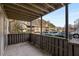 View of a spacious covered patio perfect for relaxing and entertaining in a quiet community at 707 Woodcliff Dr, Atlanta, GA 30350