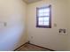 Laundry room featuring a window, hookups and wood-look flooring at 895 Smoketree Dr, Tucker, GA 30084