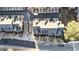 Aerial shot of townhome community showcasing the layout, landscaping, and parking at 142 Perimeter Walk, Atlanta, GA 30338