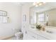 Bright bathroom with double vanity, toilet, and tile flooring at 142 Perimeter Walk, Atlanta, GA 30338