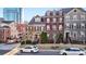 Charming townhomes with brick accents, manicured lawns, and well-maintained landscaping at 142 Perimeter Walk, Atlanta, GA 30338