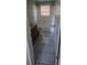 Bathroom featuring tiled floors and walls, a vanity, and a bathtub at 2224 Elizabeth Se Ave, Smyrna, GA 30080