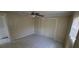 Bedroom with tiled floor, ceiling fan, and natural light from the window at 2224 Elizabeth Se Ave, Smyrna, GA 30080