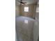 A bedroom features tile flooring, neutral walls, and a ceiling fan for added comfort at 2224 Elizabeth Se Ave, Smyrna, GA 30080