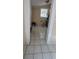 The utility area features a window, tile floors, and access to a storage area at 2224 Elizabeth Se Ave, Smyrna, GA 30080