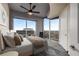Bright bedroom with large windows, balcony access, and ceiling fan at 400 W Peachtree Nw St # 3204, Atlanta, GA 30308