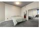 Bedroom featuring mirrored closets, city views, and ensuite bathroom access at 400 W Peachtree Nw St # 3204, Atlanta, GA 30308