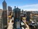 Gorgeous city view capturing modern high-rise buildings and an outdoor pool in a desirable urban setting at 400 W Peachtree Nw St # 3204, Atlanta, GA 30308