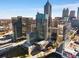 Expansive city view offering a glimpse of an outdoor pool and the impressive architecture of urban high-rises at 400 W Peachtree Nw St # 3204, Atlanta, GA 30308