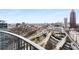 The Atlanta skyline is featured in this view from the balcony overlooking the highways below at 400 W Peachtree Nw St # 3204, Atlanta, GA 30308
