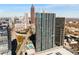 Aerial view of the city with high rise buildings and busy streets at 400 W Peachtree Nw St # 3204, Atlanta, GA 30308