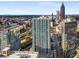 Wide angle aerial shot shows high rise buildings surrounded by an overcast sky in the city at 400 W Peachtree Nw St # 3204, Atlanta, GA 30308