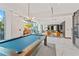 Spacious game room with pool table and cozy lounge area, perfect for entertaining residents at 400 W Peachtree Nw St # 3204, Atlanta, GA 30308