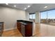 Kitchen featuring stainless steel appliances, granite countertops, and large windows with city views at 400 W Peachtree Nw St # 3204, Atlanta, GA 30308