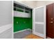 Bright laundry room with storage and shelving at 400 W Peachtree Nw St # 3204, Atlanta, GA 30308
