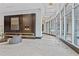 Spacious lobby with fireplace, wall art, and expansive windows offering abundant natural light at 400 W Peachtree Nw St # 3204, Atlanta, GA 30308
