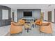 Modern lounge area features comfortable seating, fireplace and TV for residents at 400 W Peachtree Nw St # 3204, Atlanta, GA 30308