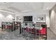 Entertainment lounge with ample seating, a large TV, and sleek countertops at 400 W Peachtree Nw St # 3204, Atlanta, GA 30308