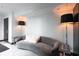 Inviting lounge area with modern gray sofa and sleek side tables at 400 W Peachtree Nw St # 3204, Atlanta, GA 30308