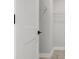 Walk-in closet with wire shelving, door, and neutral walls at 911 Echo Park Dr, Suwanee, GA 30024