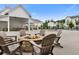 Community fire pit and lounge area with ample seating, near a pool and clubhouse at 911 Echo Park Dr, Suwanee, GA 30024
